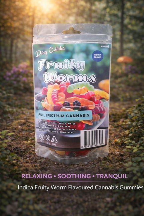 Package of Gibbles Dog Edibles Fruity Worms cannabis gummies with full spectrum indica on forest background